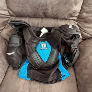 Youth Bauer hockey chest and elbow protector. New without tags.